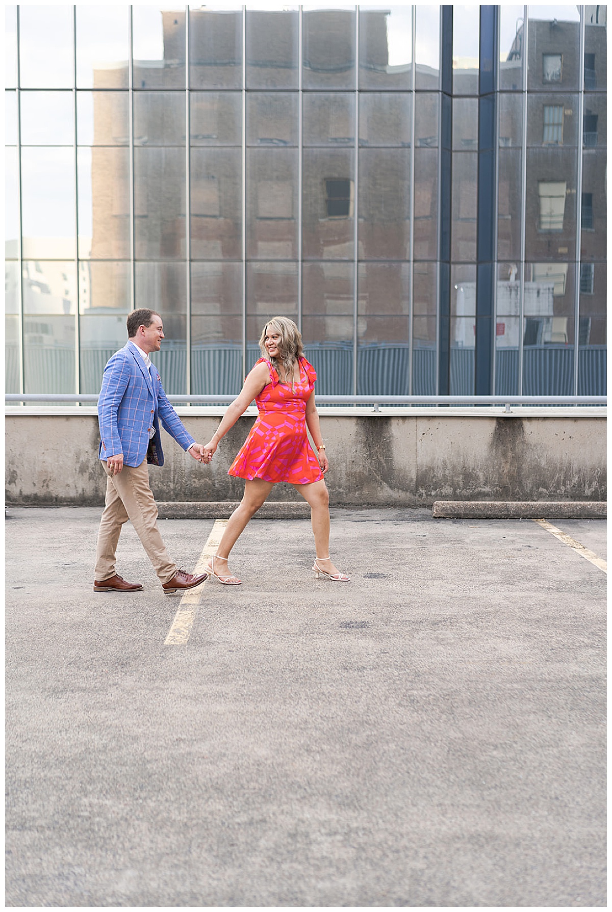 Couple walk together on the rooftop Swish & Click Photography