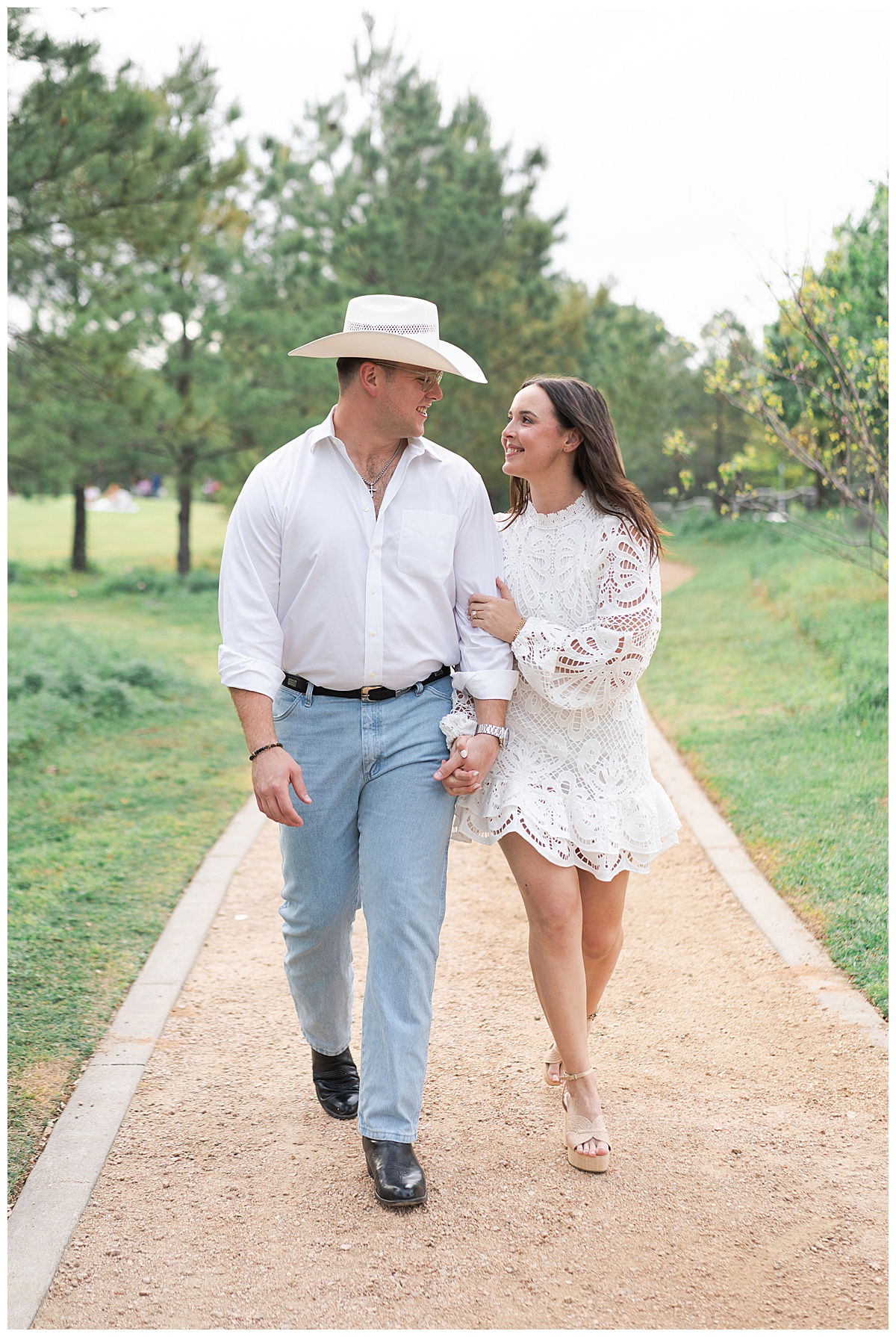 Couple walk hand in hand together Swish & Click Photography