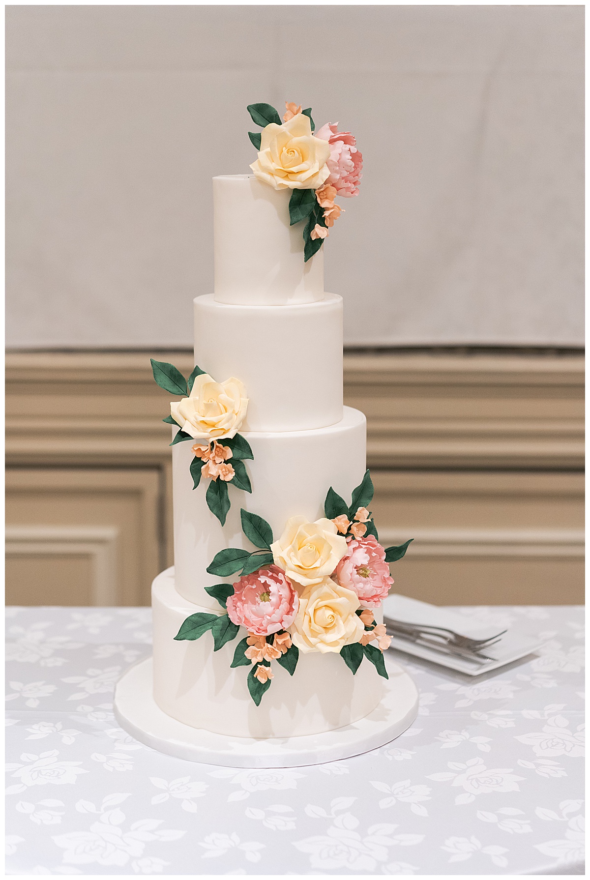 Wedding cake florals by Swish & Click Photography