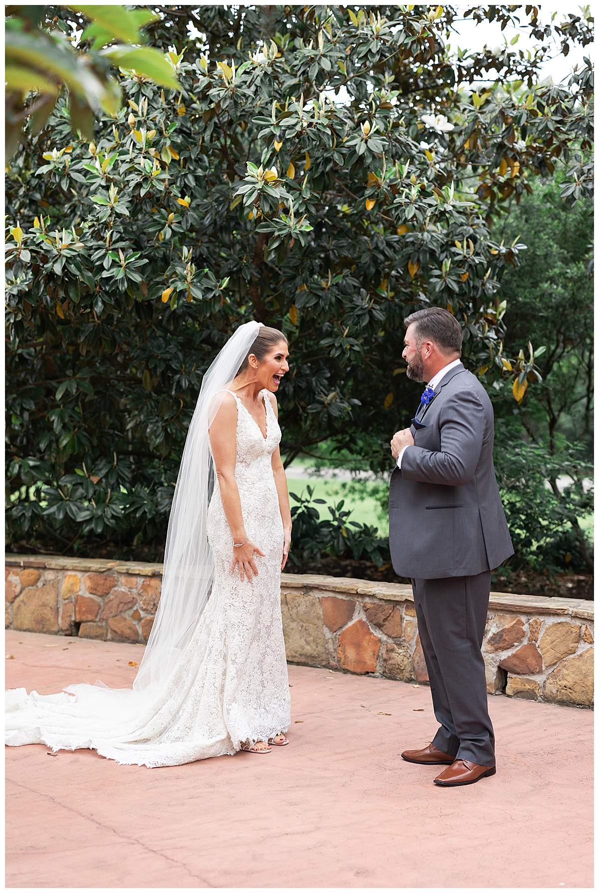 Groom sees bride for the first time by Houston’s Best Wedding Photographers 