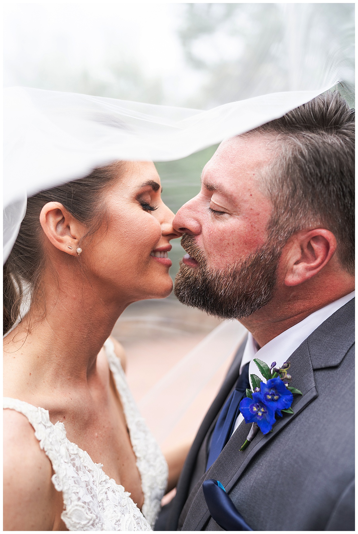 Husband and wife hold each other close by Madera Estates Wedding Photographer