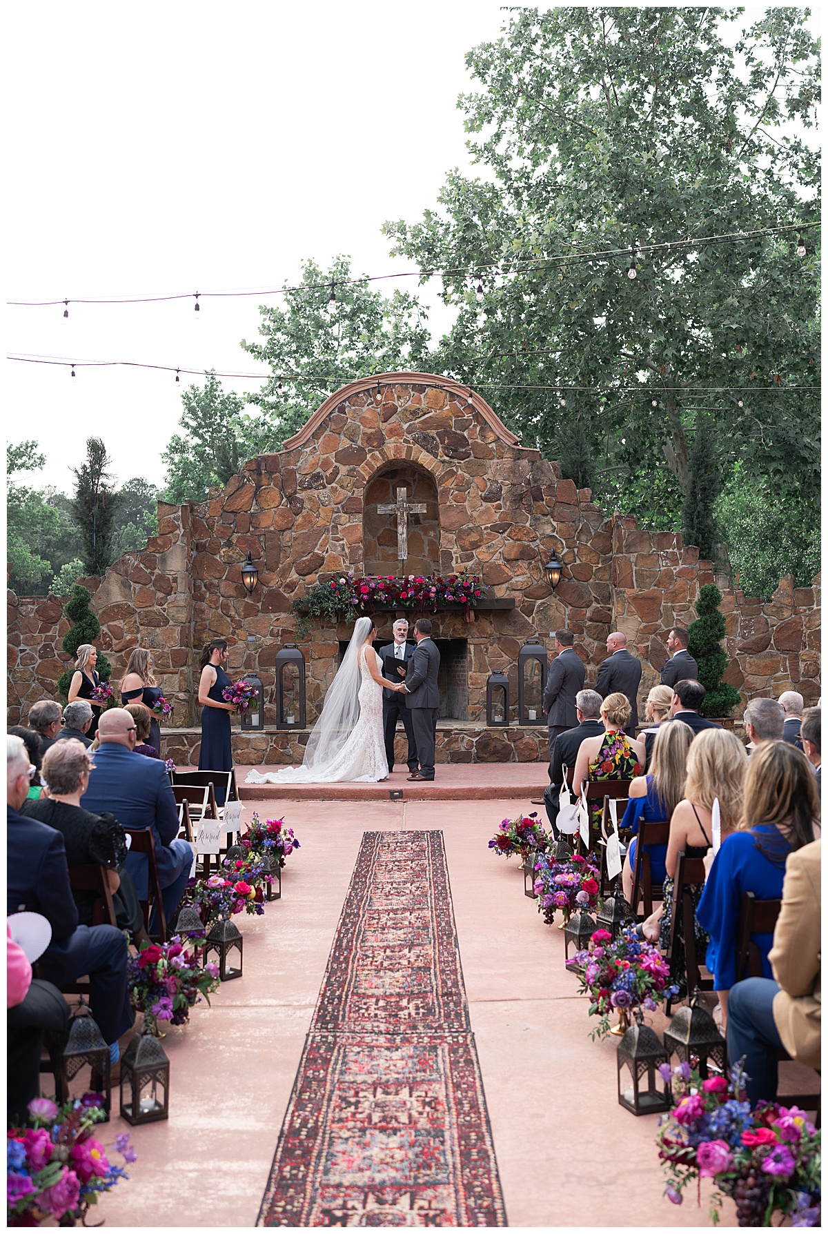 Couple stand at the altar by Houston’s Best Wedding Photographers 