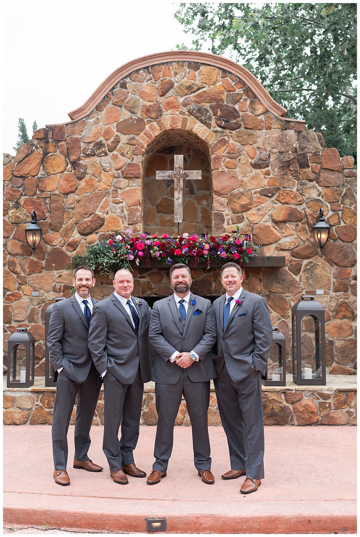 Groom stand with wedding party by Swish & Click Photography