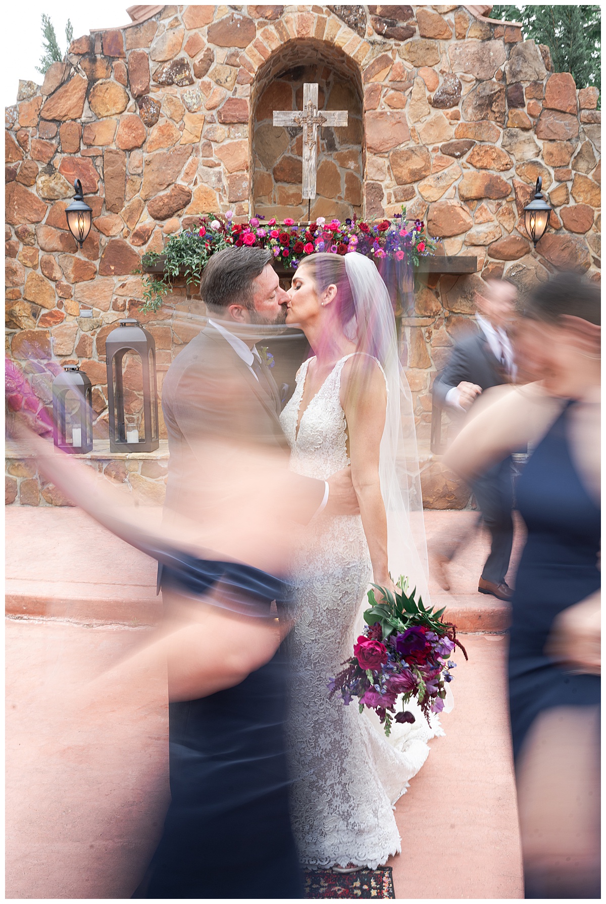 Husband and wife share a kiss for Madera Estates Wedding Photographer