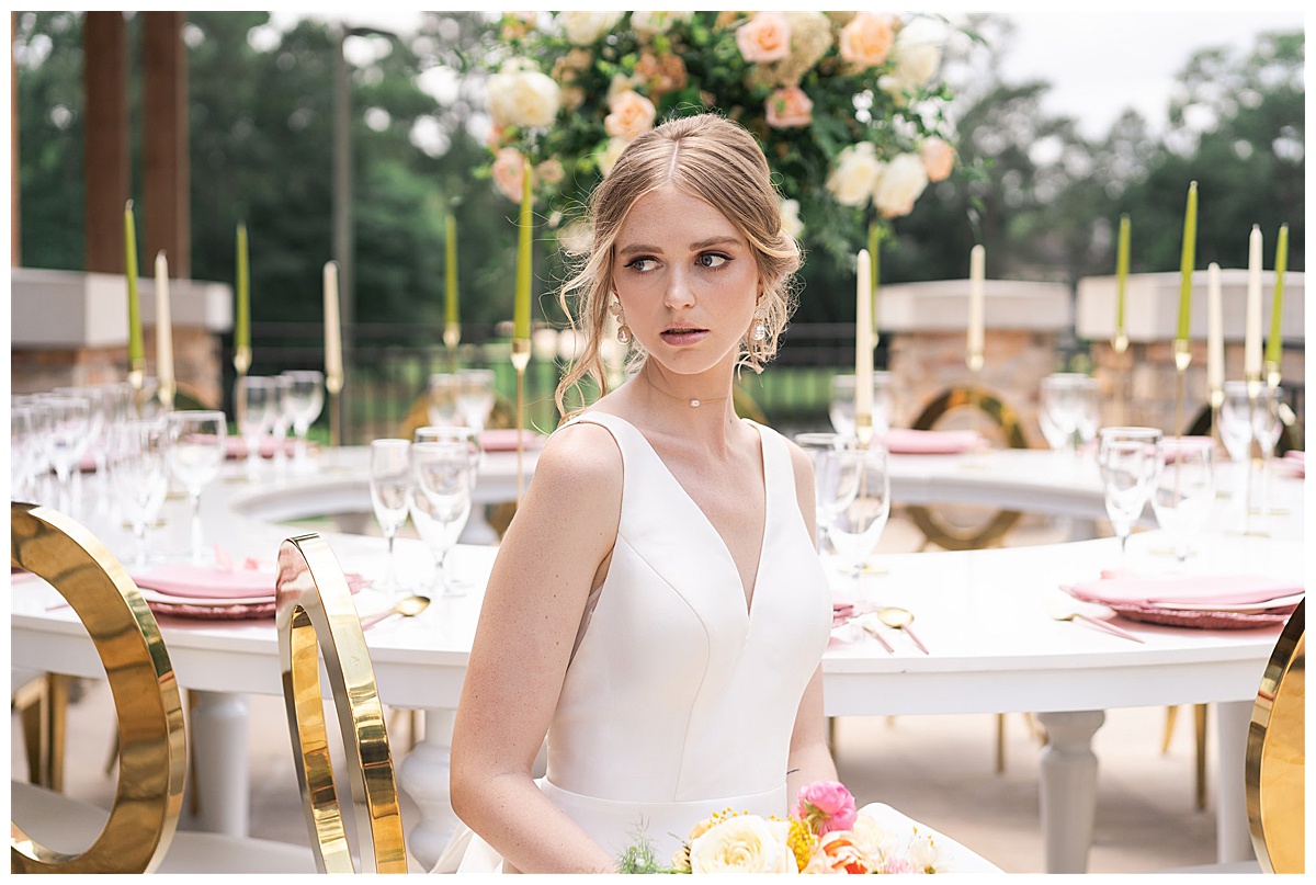 Bride holds bouquet at The Woodlands Country Club