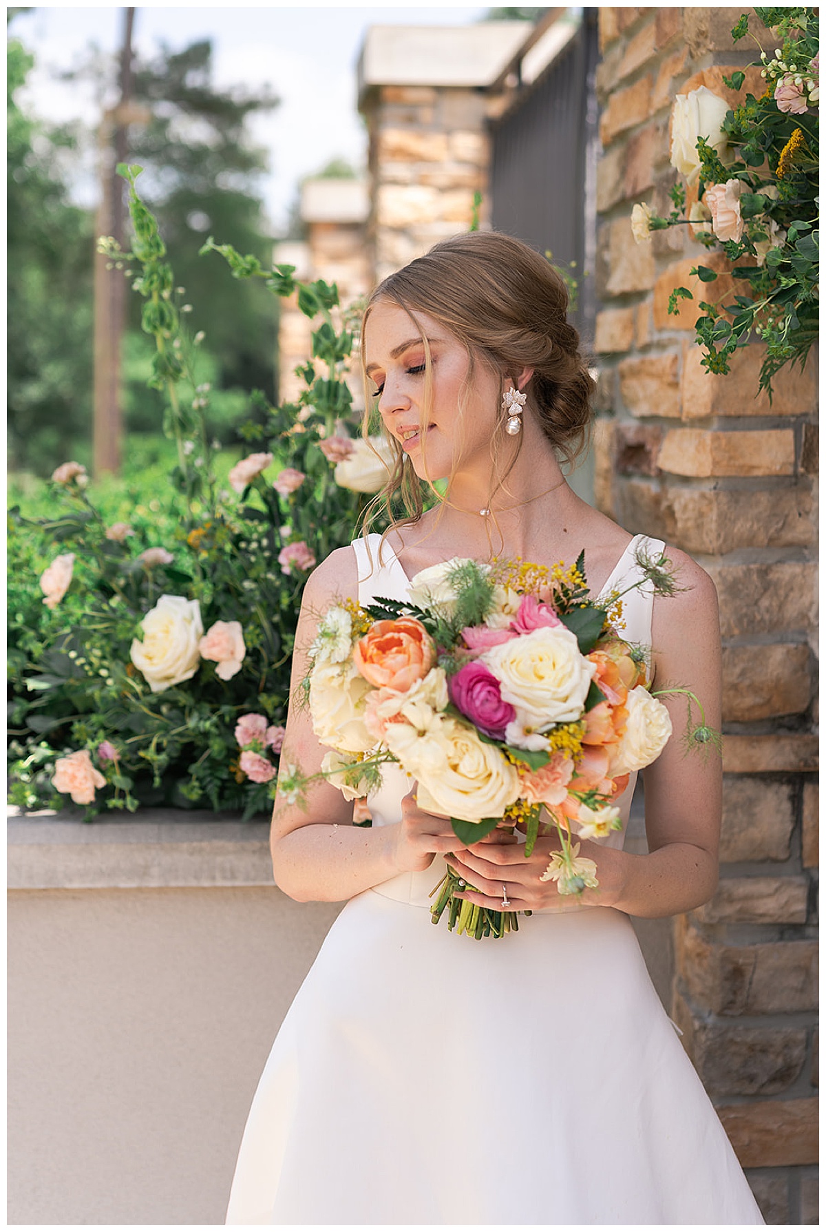 Bride holds wedding bouquet for Swish & Click Photography