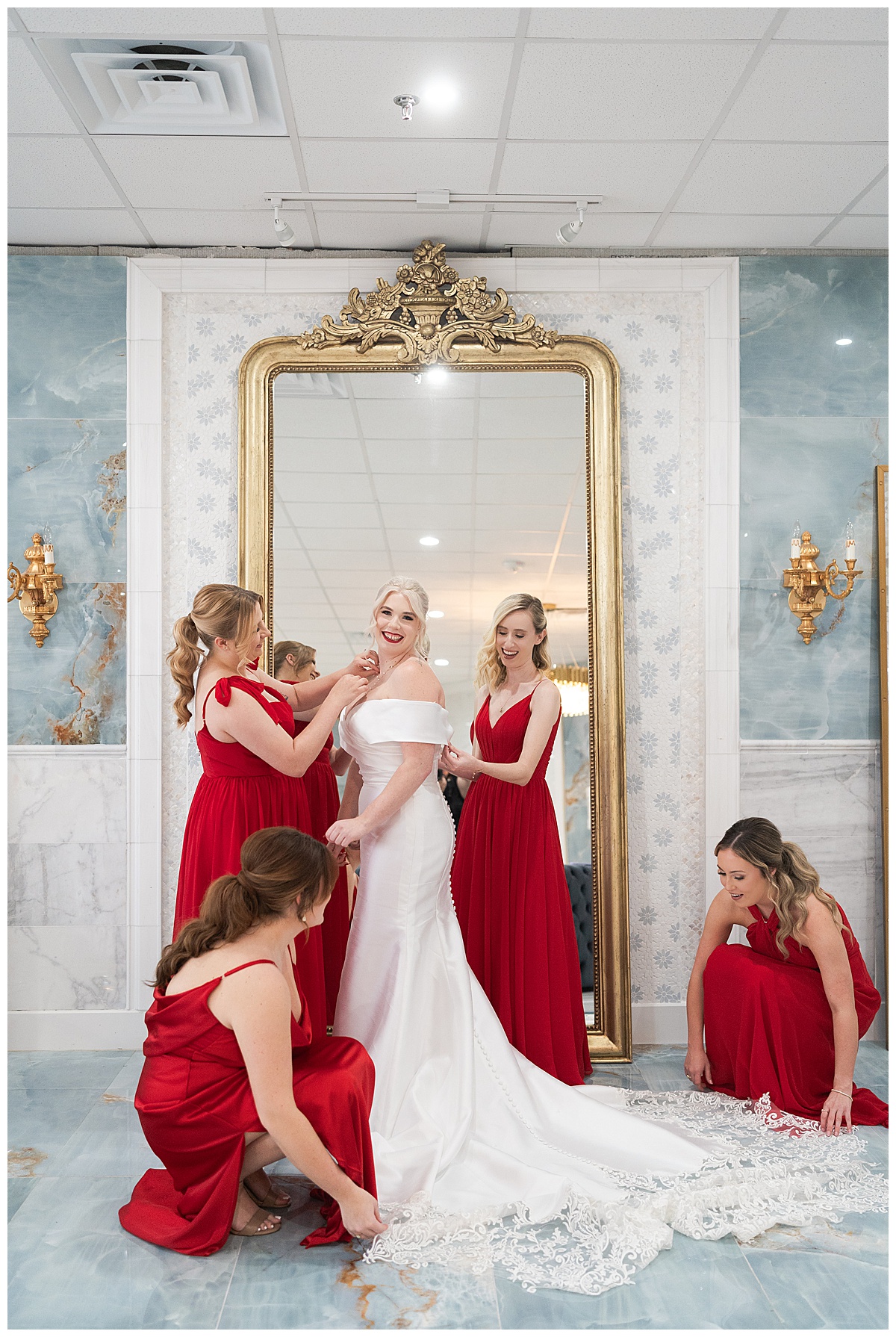 Bride gets ready surrounded by bridal party by Modern Houston Wedding Photographer