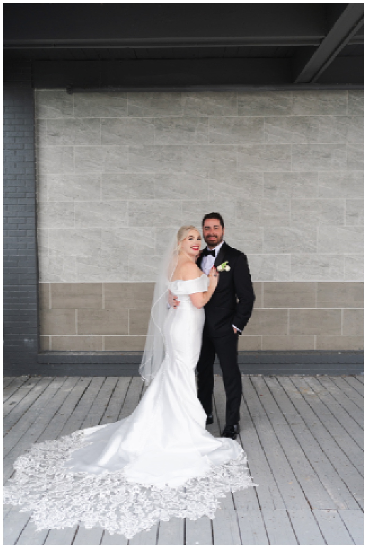 Bride and groom hold each other close for Swish & Click Photography