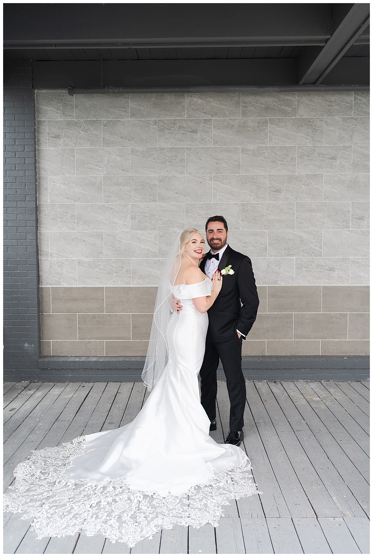 Bride and groom share a hug for Modern Houston Wedding Photographer