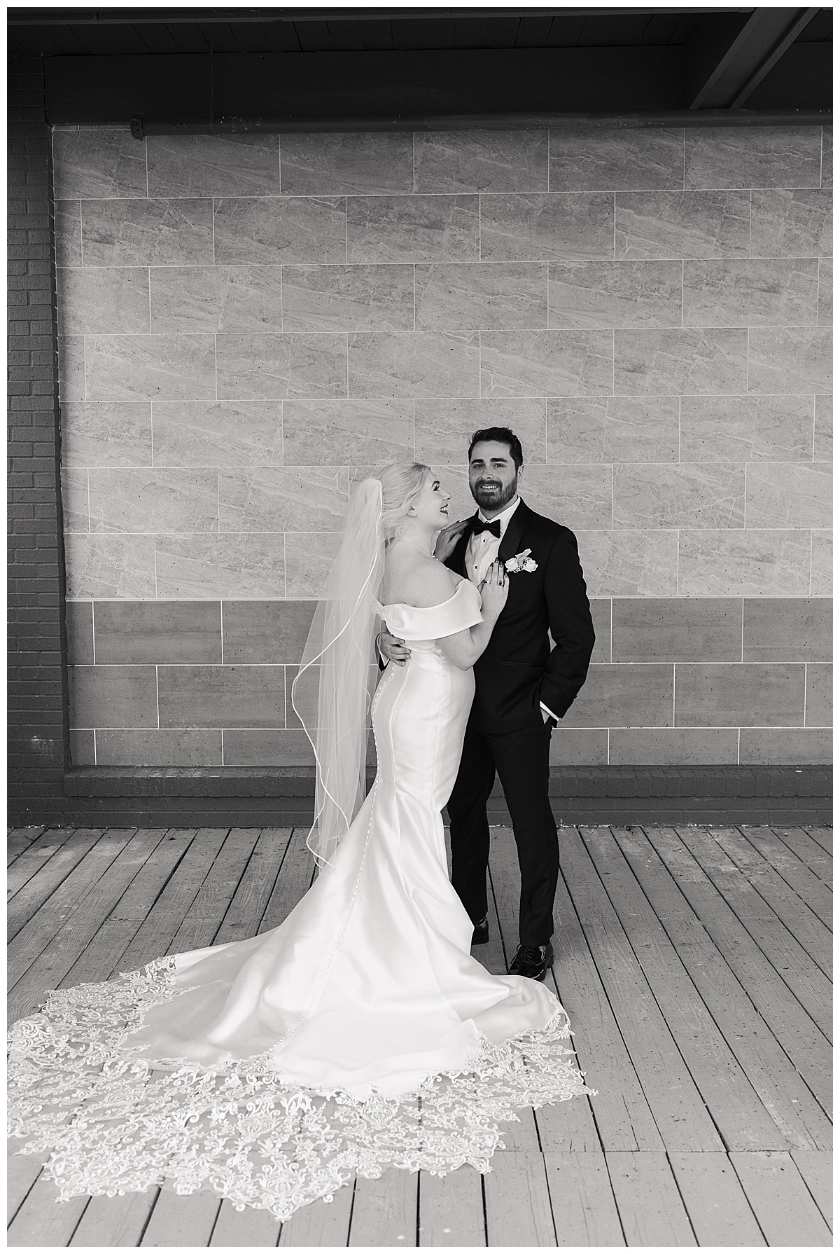 Bride and groom hold each other close for Swish & Click Photography