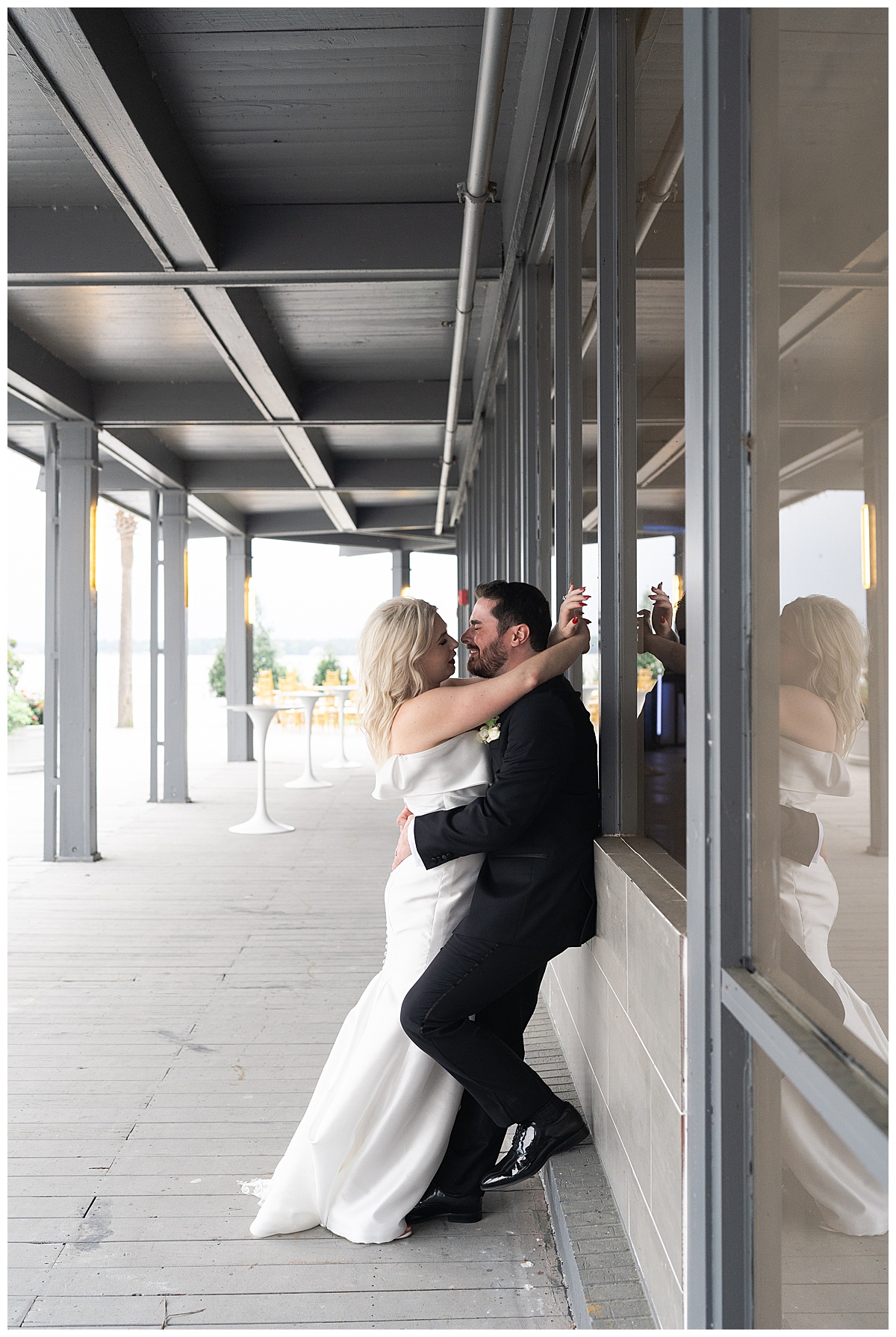 Couple hold each other close by Modern Houston Wedding Photographer