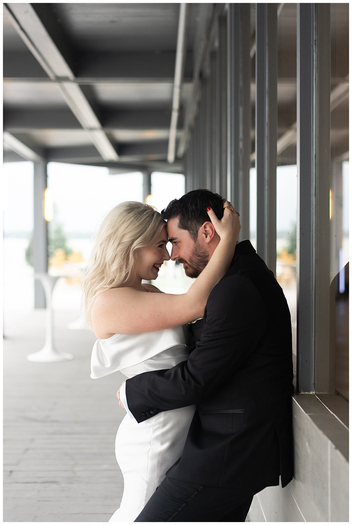 Bride and groom hold each other by Swish & Click Photography