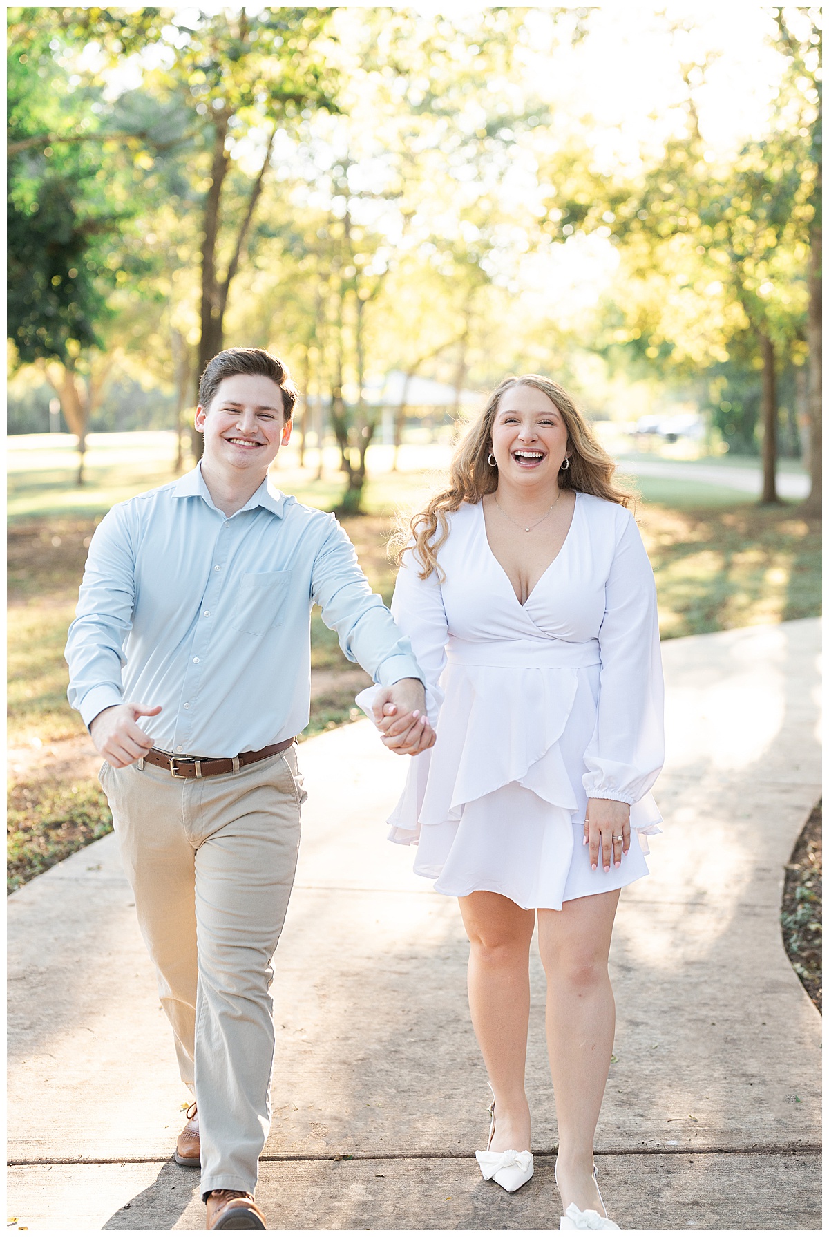 couple walking and holding hands for swish & click photography.