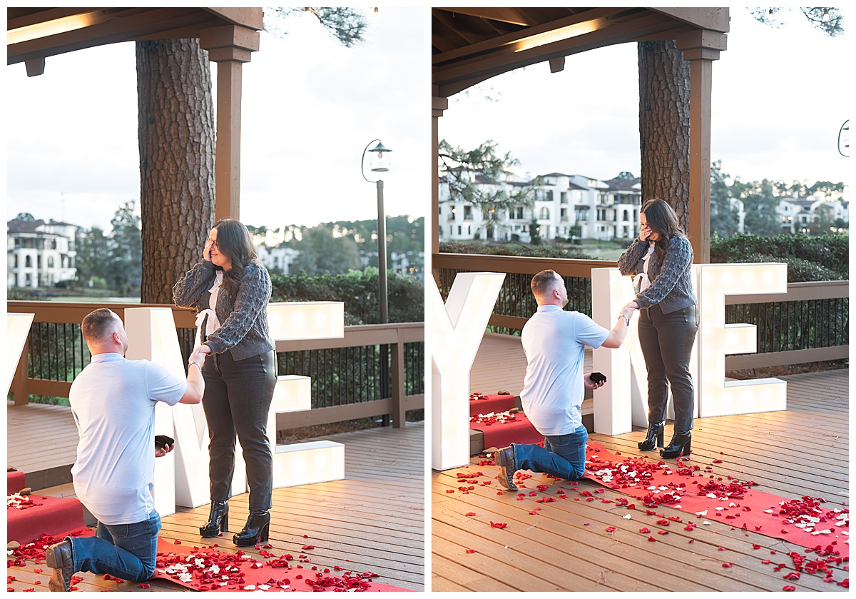 A boyfriend getting on bended knee to propose to his girlfriend.
