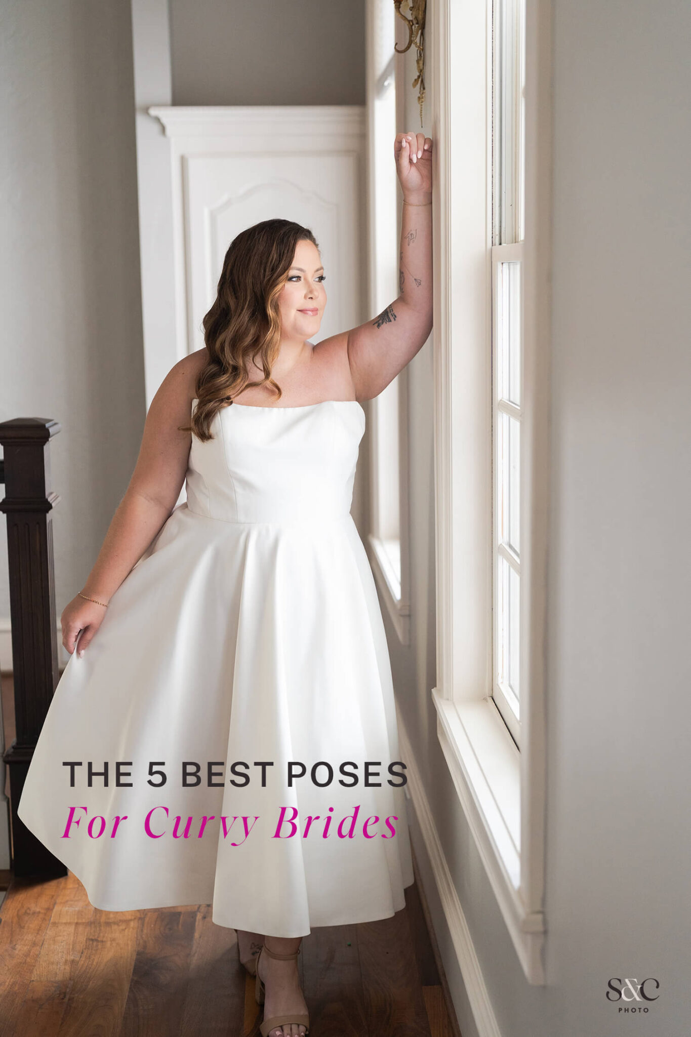 Bride looks out the window on her wedding day