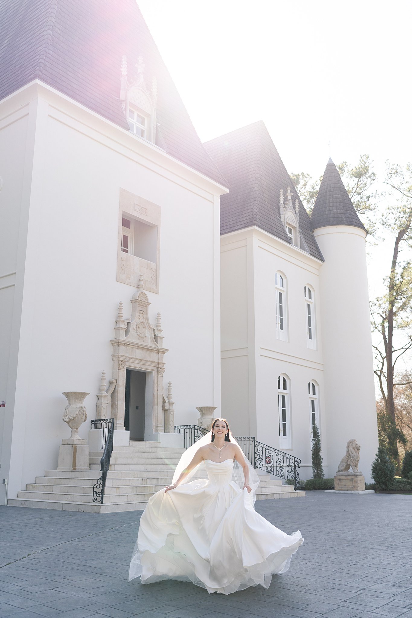 Swish and Click Photography captures a bride running with blurred motion at Chateau Nouvelle during her bridal session