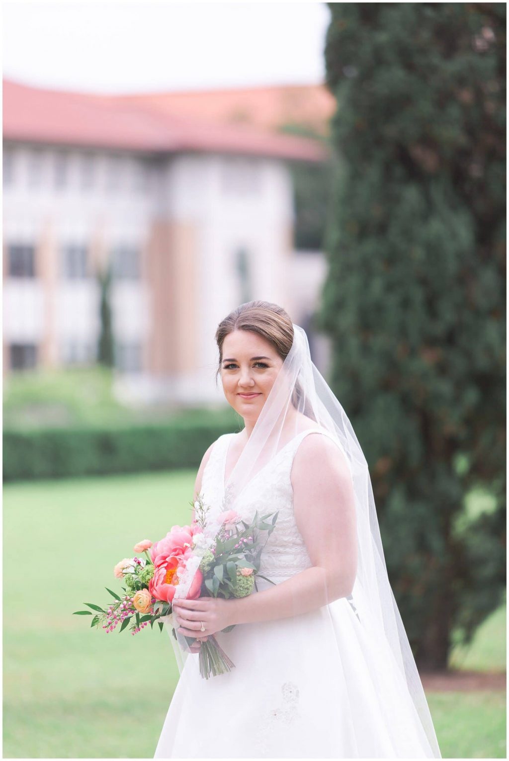 Houston bride poses at Rice University in Houston Texas by Swish and Click Photography