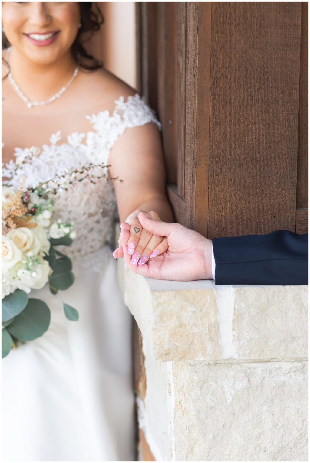 first look between bride and groom at Bridal Oaks in Cypress Texas by Houston wedding photographer Swish and Click Photography